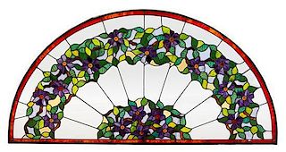 A Large Leaded Glass Transom Window Height 35 x width 69 inches.