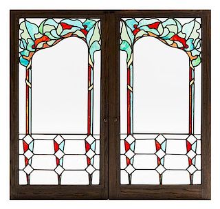 A Set of Four Leaded Glass Windows Largest: 37 3/4 x 20 inches.