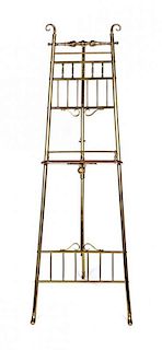 A Victorian Brass Easel Height 59 1/4 inches.