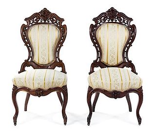 A Pair of Rococo Revival Rosewood Side Chairs Height 39 1/2 inches.