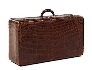 An Alligator Skin Valise Height 9 1/4 x width 29 x depth 16 1/2 inches.