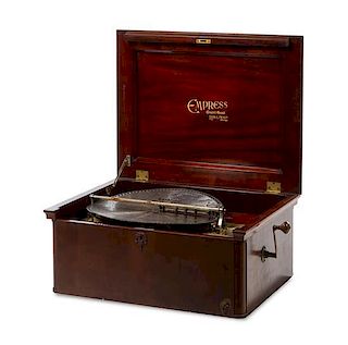 An Empress Concert Grand Table Top Disc Music Box, Retailed by Lyon and Healy Height 13 x width 28 1/2 x depth 22 inches.