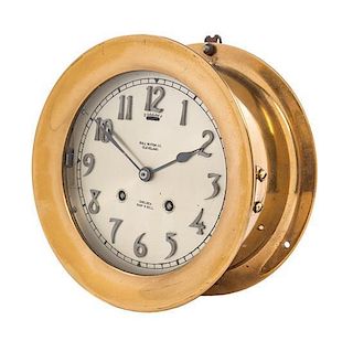 A Brass Ship's Bell Clock Diameter 7 1/4 inches.