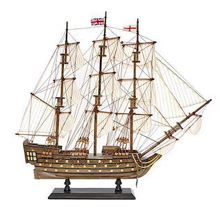A Painted Wood Model of the H.M.S Victory Height 21 inches.