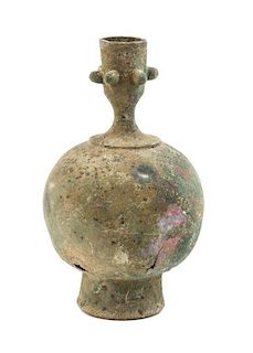 An Islamic Archaic Bronze Vase Height 6 3/8 inches.