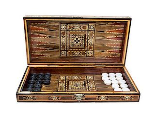A Syrian Marquetry Inlaid Game Board Height 2 3/4 x width 15 1/4 x depth 7 1/2 inches when closed.
