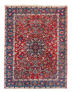 * A Isfahan Wool Rug 7 feet x 5 feet 3 inches