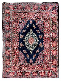 A Persian Wool Rug 12 feet 10 inches x 8 feet 8 inches.