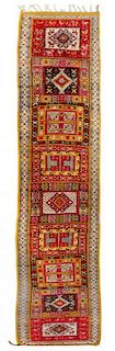 A Moroccan Wool Runner 13 feet 9 inches x 2 feet 4 inches.