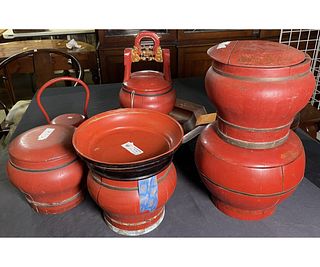 MIXED LOT OF NINE RED LACQUERED BASKETS