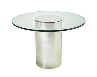 A Brueton-style polished chrome and glass dining table
