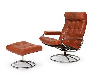 A modern chrome and leather armchair and ottoman