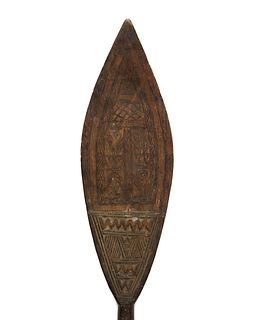 A Papua New Guinean carved wood oar