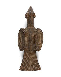 A Cameroonian carved wood bird mask