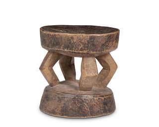 A Malian carved wood stool