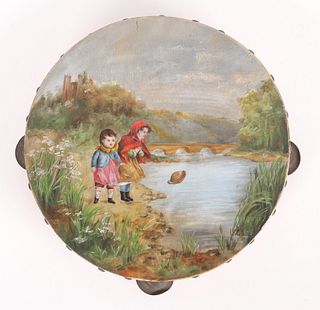A Folk Art Painted Tambourine