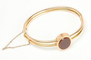 Gold Bracelet with Oval Orange Stone