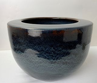 A Large Dark Blue Glazed Ceramic Pot