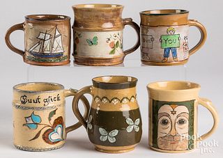 Six Left Handed Russell Henry stoneware mugs