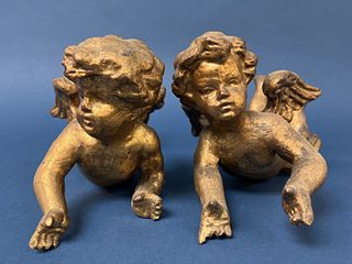 Pair of Carved Putti