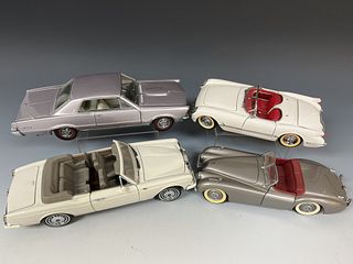 Four Franklin and Danbury Mint Die Cast Cars