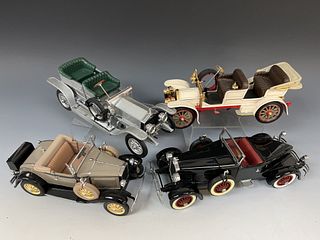 Four Franklin and Danbury Mint Die Cast Cars