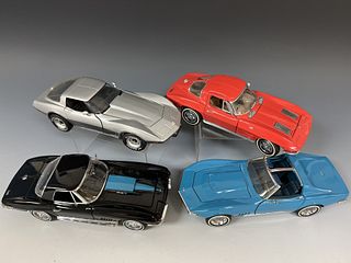 Four Franklin Mint Die Cast Cars