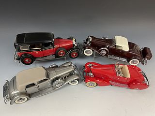 Four Franklin and Danbury Mint Model Cars