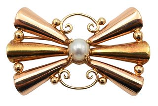 Tiffany & Company 14 Karat Gold Brooch, set with center pearl, length 1 3/4 inches, 8.5 grams.