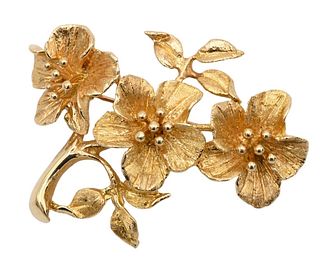 14 Karat Gold Triple Flower Brooch, height 2 inches, 18.4 grams.