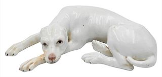 Meissen Porcelain Dog Figure, marked with crossed swords, length 5 inches.