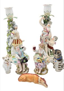 Seven Piece Porcelain Group, to include two cat shakers or bottle stops; a pair of figural candlesticks, height 10 3/4 inches.