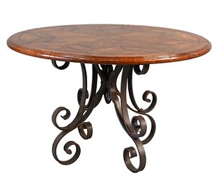 Round Kitchen Table, on wrought iron base, height 29 1/2 inches, diameter 48 inches.