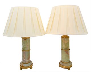 Pair of Alabaster Lamps, on bronze feet, height 23 inches.