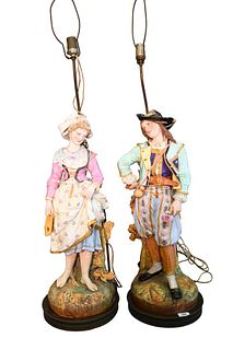 Pair of Bisque Figures Mounted as Lamps, probably French, 19th century, (hat repaired, chip at base, repair at feet), figure height 28 inches, total h