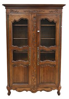 Henredon Contemporary Louis XV Style Cabinet, having molded edge top over pair of grillwork doors, raised on cabriole legs, interior with shelves havi