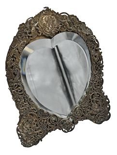 Silver Heart Shaped Framed Mirror with Putti's, height 10 1/2".