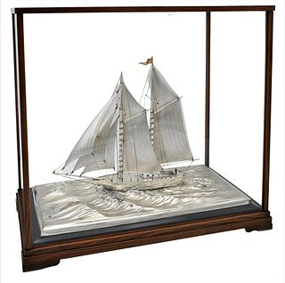 Large Sterling Silver Two Masted Boat, marked sterling in glass case, height 15 1/2 inches, top 9 1/2" x 17". Provenance: From the Robert Circiello Co