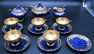 14 Piece Nippon Porcelain Tea Set, cobalt blue with gold decoration; teapot height 5 3/4 inches.