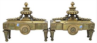 Pair of Brass Neoclassical Chenets, with urns and wreathing, height 12 inches, width 13 1/2 inches.