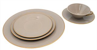 82 Piece Calvin Klein Swid Powell Porcelain Dinnerware Set, having gilt border.