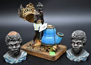 Three Blackamoor Figures, To include small glass perfume bottle with porcelain; figure holding basket; along with a blackamoor bust inkwell along with