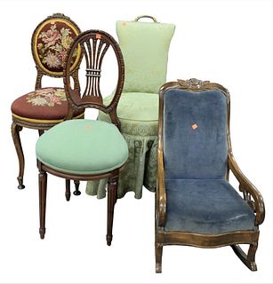 Seven Piece Children's Chair Lot, to include pair of needlepoint upholstered chairs, a rocker, a caned back swivel chair, etc.; tallest chair height 3