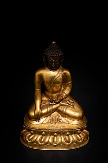 Xuande, Ming Dynasty: A Gilt Bronze Sakyamuni Buddha Statue