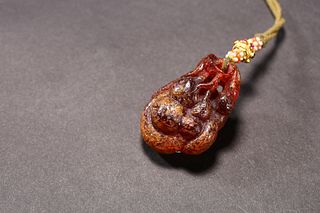 Ming Dynasty: An Amber Pendant