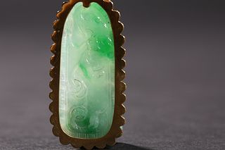 Republic Period: A Jadeite Jade  with Encased Gold Rim Pendant 