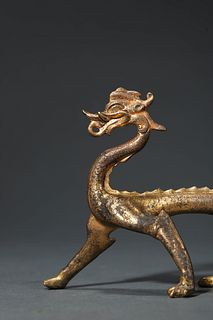 Tang: A Gilt Bronze Dragon Figurine