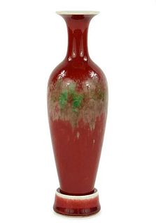 A Chinese Peach Bloom Glazed Amphora Vase with Stand.