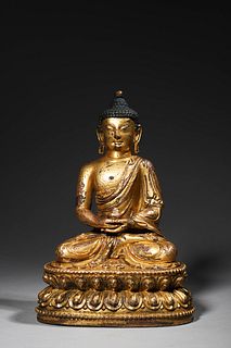 Ming: A gilt bronze Sakyamuni Buddha statue
