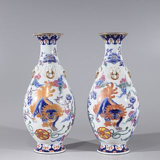 Pair of Chinese Famille Rose Enameled Gilt Porcelain Foo Lion Vases
